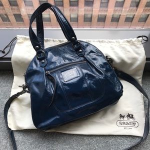 Blue patent leather Coach Poppy crossbody bag.